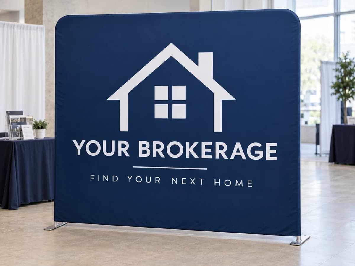 Sample blue brokerage fabric display at a real estate home-show booth