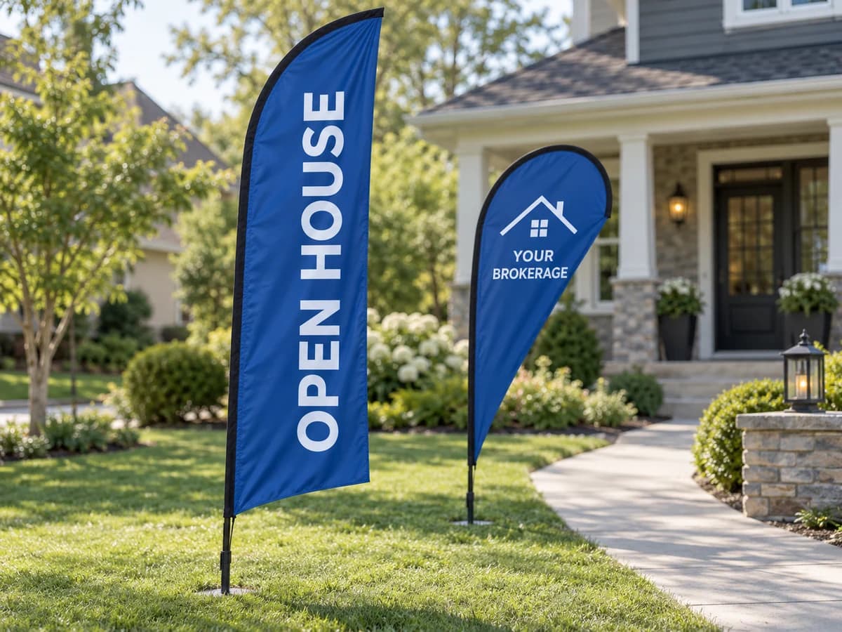 Sample open house feather and teardrop flags beside a residential walkway